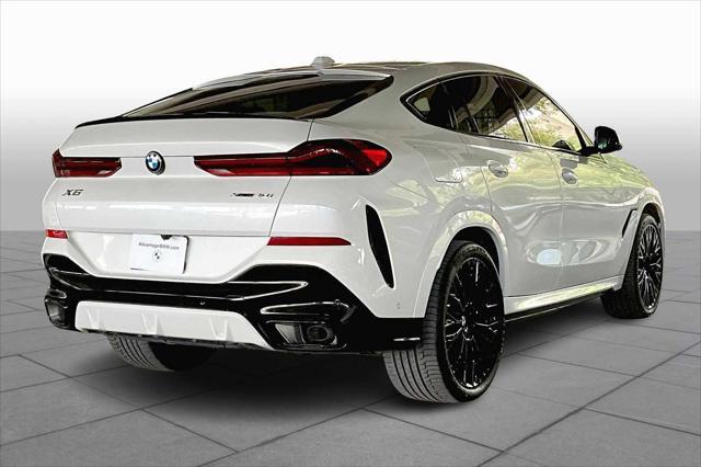 used 2024 BMW X6 car, priced at $70,473