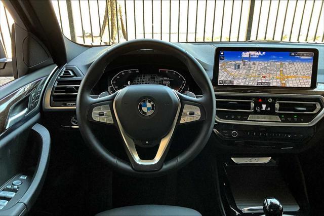 used 2025 BMW X4 car, priced at $51,700