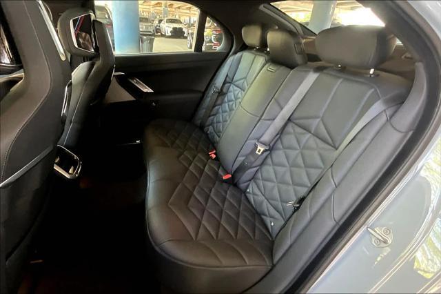 used 2024 BMW 740 car, priced at $73,426