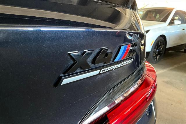 used 2024 BMW X4 M car, priced at $70,893