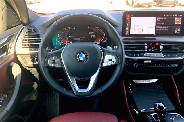 used 2025 BMW X4 car, priced at $51,585