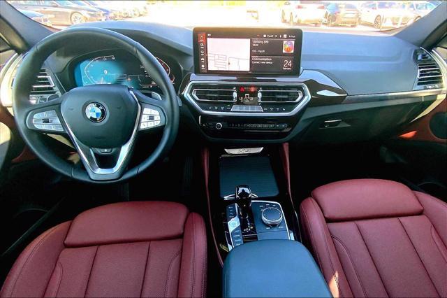 used 2025 BMW X4 car, priced at $51,585