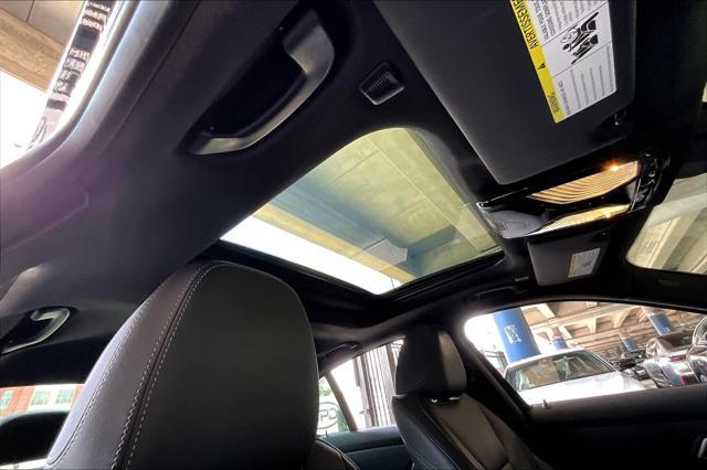 used 2023 BMW 330e car, priced at $32,986