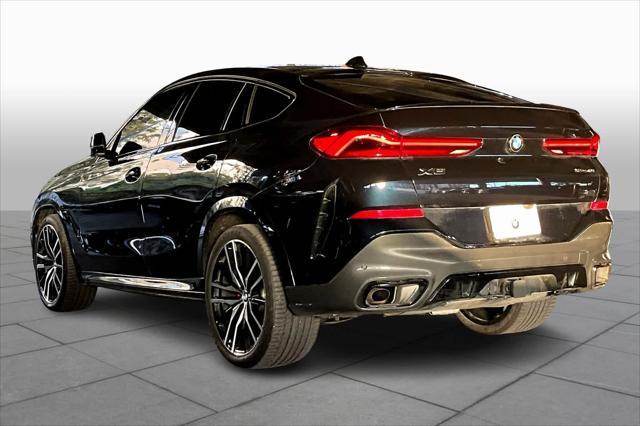 used 2022 BMW X6 car, priced at $56,941