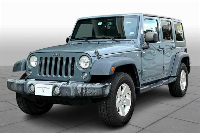 used 2014 Jeep Wrangler Unlimited car, priced at $19,986