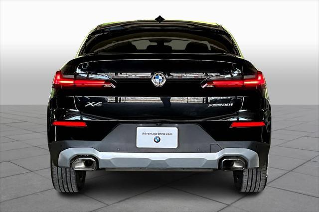 used 2025 BMW X4 car, priced at $51,560
