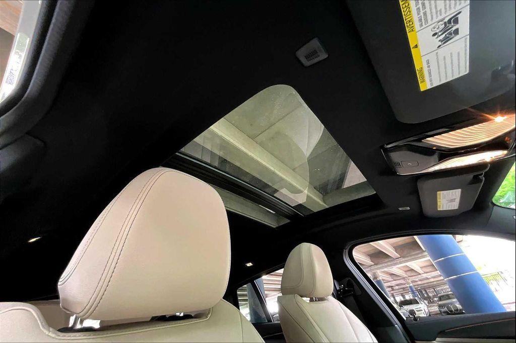 used 2023 BMW X4 car, priced at $51,560
