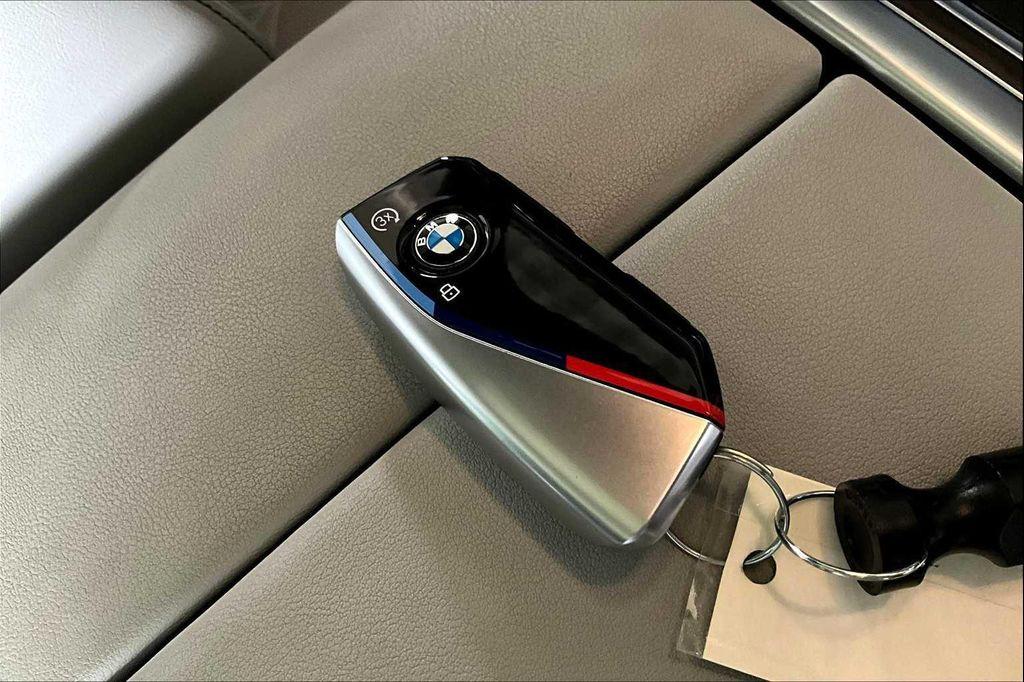 used 2024 BMW X6 car, priced at $59,899