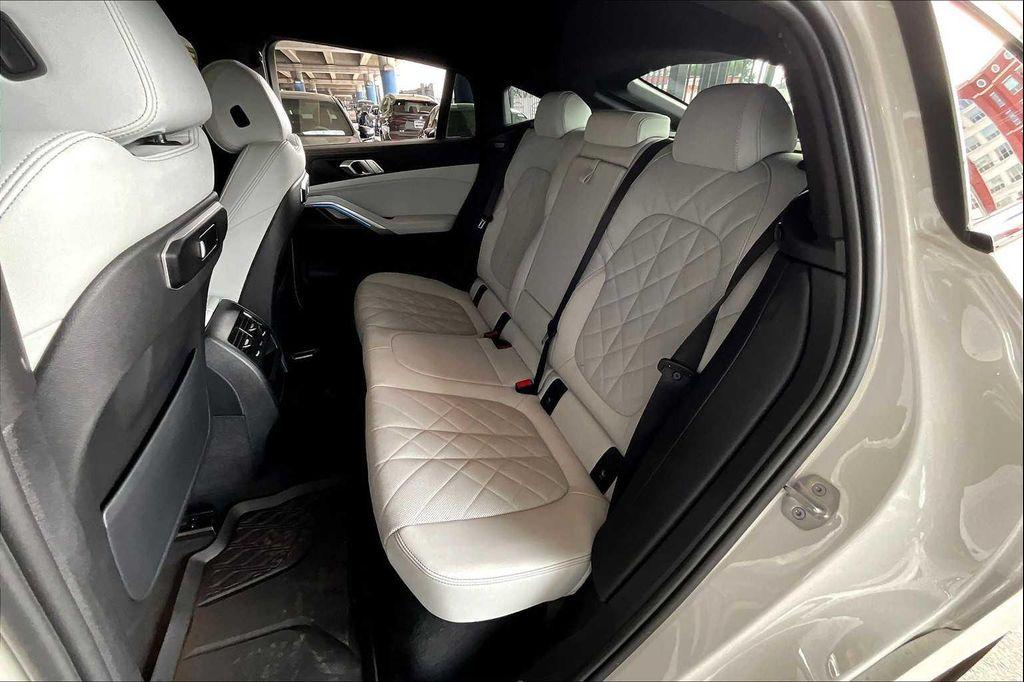 used 2024 BMW X6 car, priced at $59,899