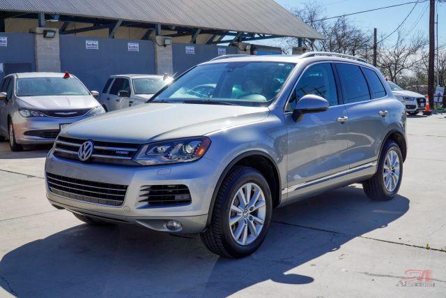 used 2011 Volkswagen Touareg Hybrid car, priced at $6,999