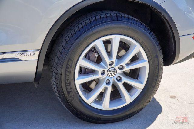 used 2011 Volkswagen Touareg Hybrid car, priced at $6,999
