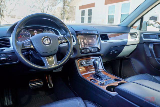 used 2011 Volkswagen Touareg Hybrid car, priced at $6,999