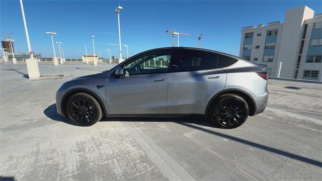 used 2025 Tesla Model Y car, priced at $41,998