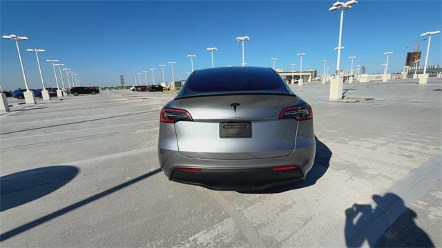 used 2025 Tesla Model Y car, priced at $41,998