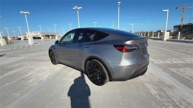 used 2025 Tesla Model Y car, priced at $41,998