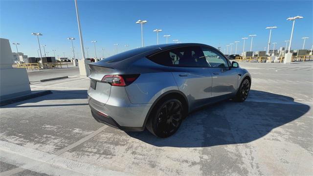 used 2025 Tesla Model Y car, priced at $41,998