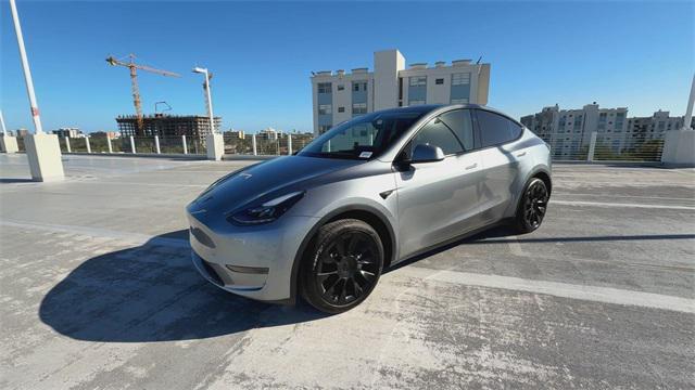 used 2025 Tesla Model Y car, priced at $41,998