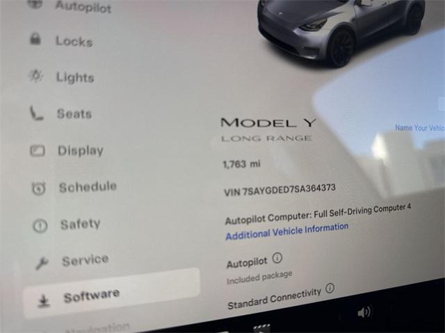 used 2025 Tesla Model Y car, priced at $41,998