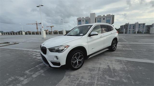 used 2018 BMW X1 car, priced at $18,588