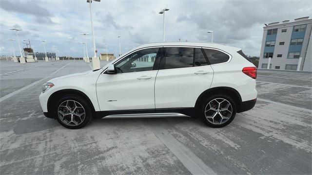 used 2018 BMW X1 car, priced at $18,588