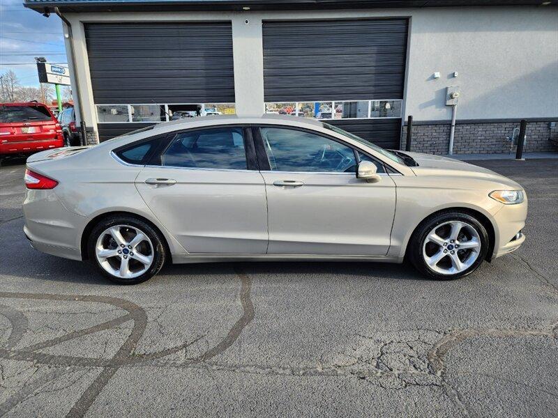 used 2016 Ford Fusion car, priced at $12,397