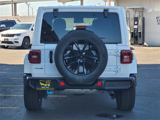 used 2024 Jeep Wrangler 4xe car, priced at $32,998