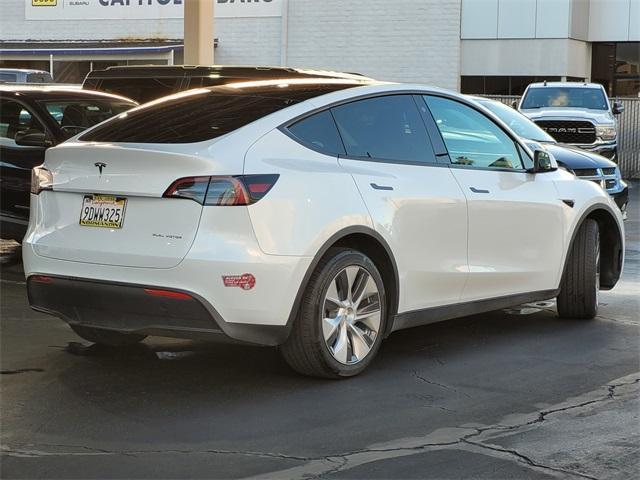 used 2023 Tesla Model Y car, priced at $34,998