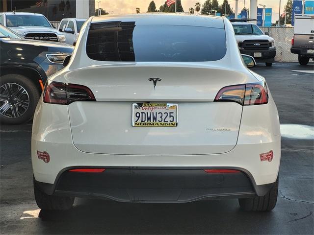 used 2023 Tesla Model Y car, priced at $34,998