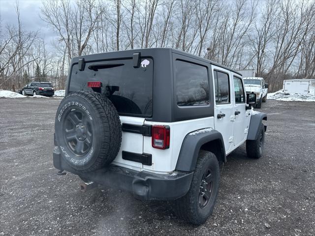 used 2016 Jeep Wrangler Unlimited car, priced at $22,955