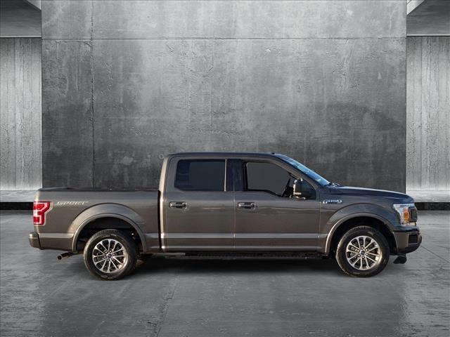 used 2018 Ford F-150 car, priced at $26,438