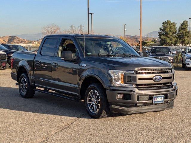 used 2018 Ford F-150 car, priced at $26,438