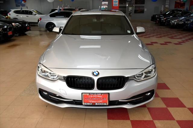 used 2018 BMW 330 car, priced at $17,981