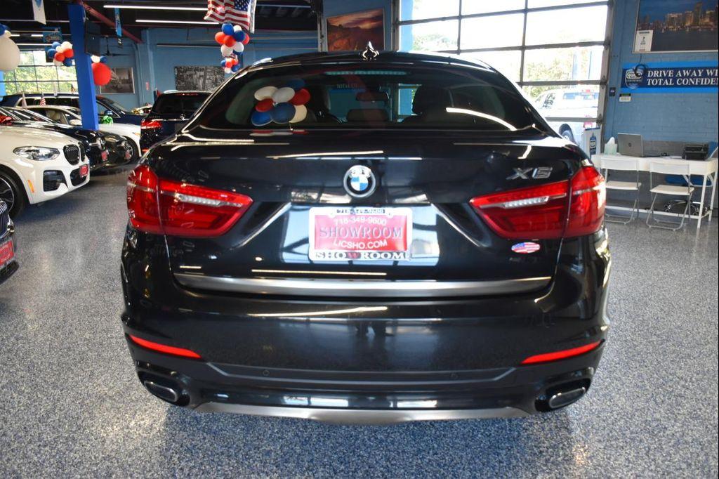 used 2018 BMW X6 car, priced at $27,891