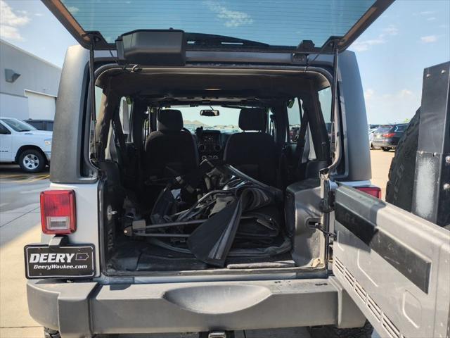 used 2013 Jeep Wrangler Unlimited car, priced at $17,550