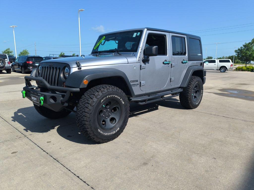 used 2013 Jeep Wrangler Unlimited car, priced at $13,990