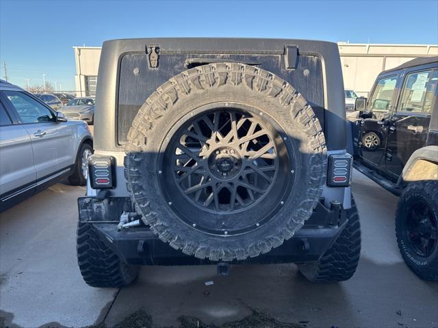 used 2013 Jeep Wrangler Unlimited car, priced at $19,449