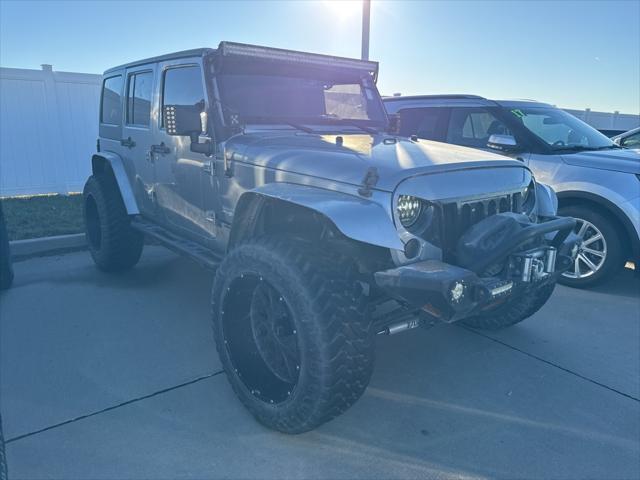 used 2013 Jeep Wrangler Unlimited car, priced at $19,449