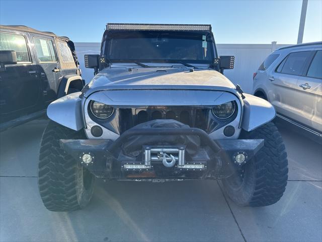 used 2013 Jeep Wrangler Unlimited car, priced at $19,449