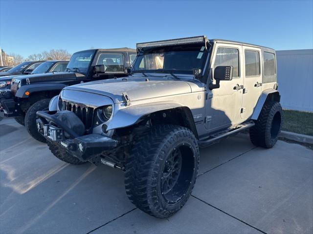 used 2013 Jeep Wrangler Unlimited car, priced at $19,449