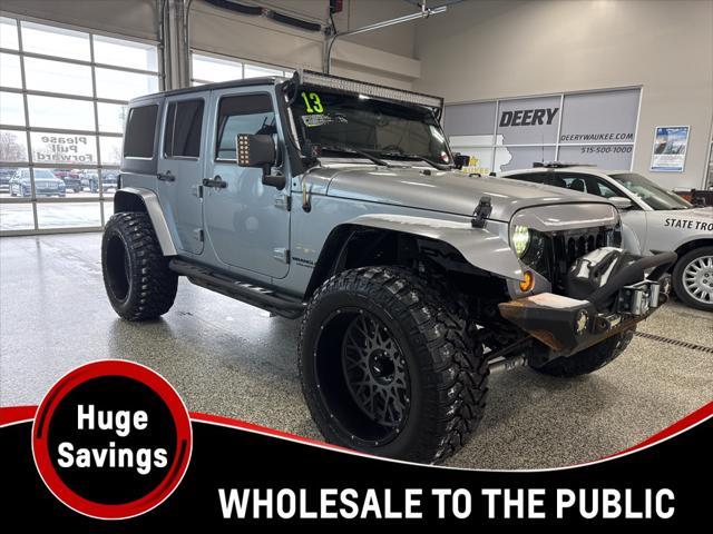 used 2013 Jeep Wrangler Unlimited car, priced at $16,899