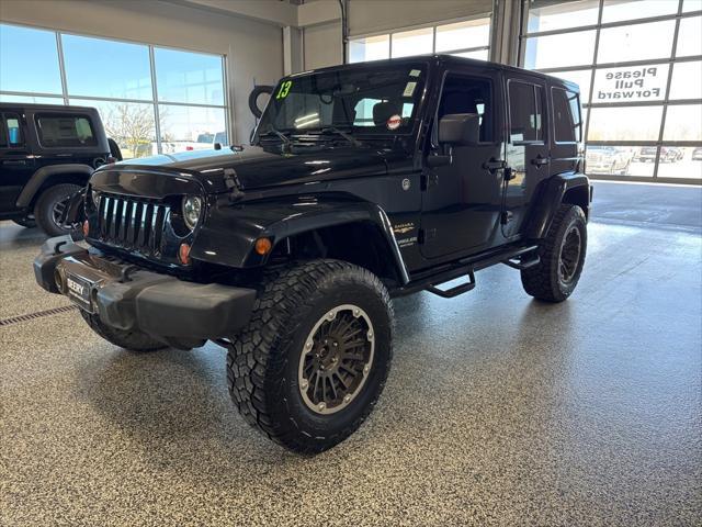 used 2013 Jeep Wrangler Unlimited car, priced at $18,949