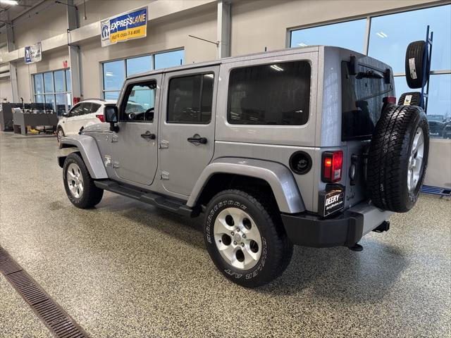 used 2015 Jeep Wrangler Unlimited car, priced at $16,875