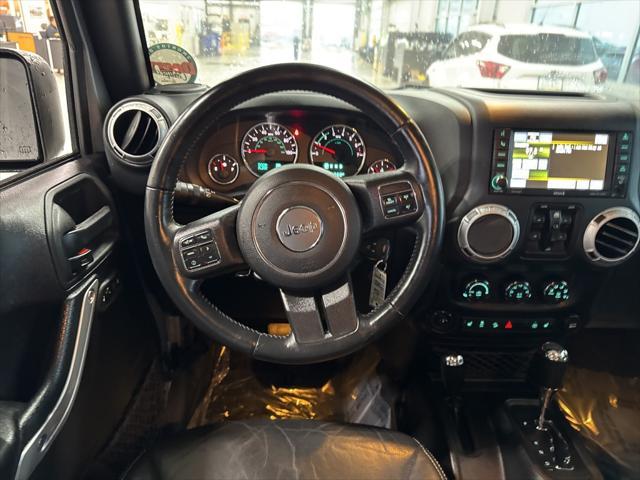 used 2015 Jeep Wrangler Unlimited car, priced at $16,875