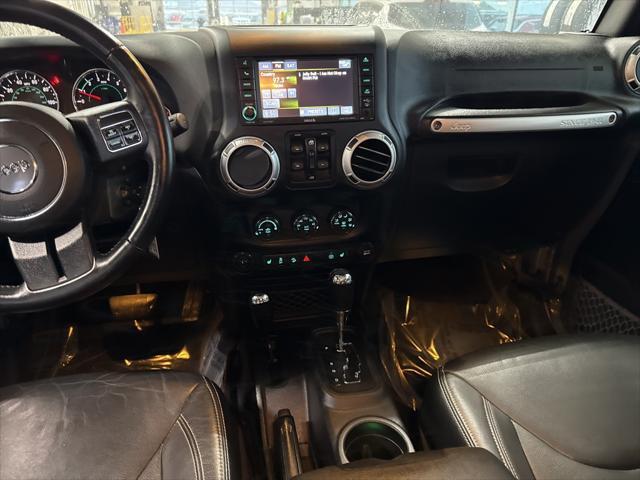 used 2015 Jeep Wrangler Unlimited car, priced at $16,875