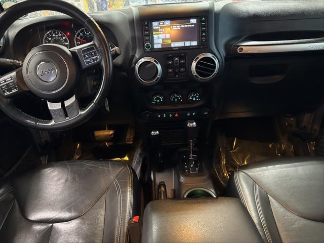 used 2015 Jeep Wrangler Unlimited car, priced at $16,875