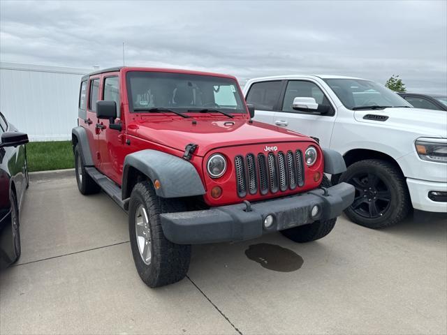 used 2011 Jeep Wrangler Unlimited car, priced at $15,000