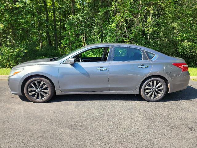 used 2018 Nissan Altima car, priced at $9,900