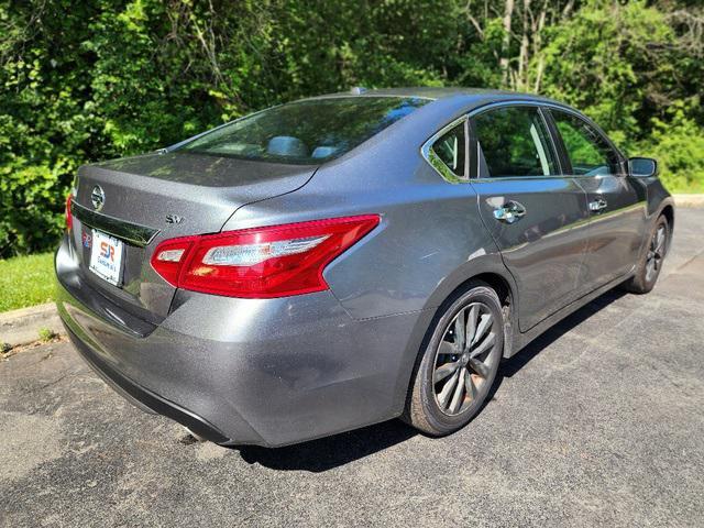 used 2018 Nissan Altima car, priced at $9,900