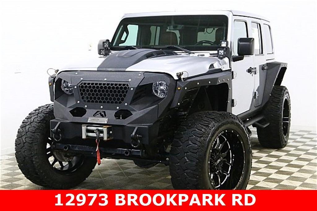used 2021 Jeep Wrangler Unlimited car, priced at $37,969