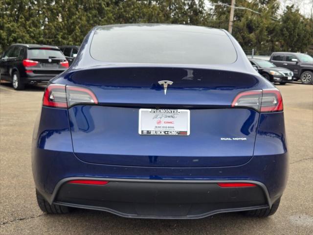 used 2023 Tesla Model Y car, priced at $32,000